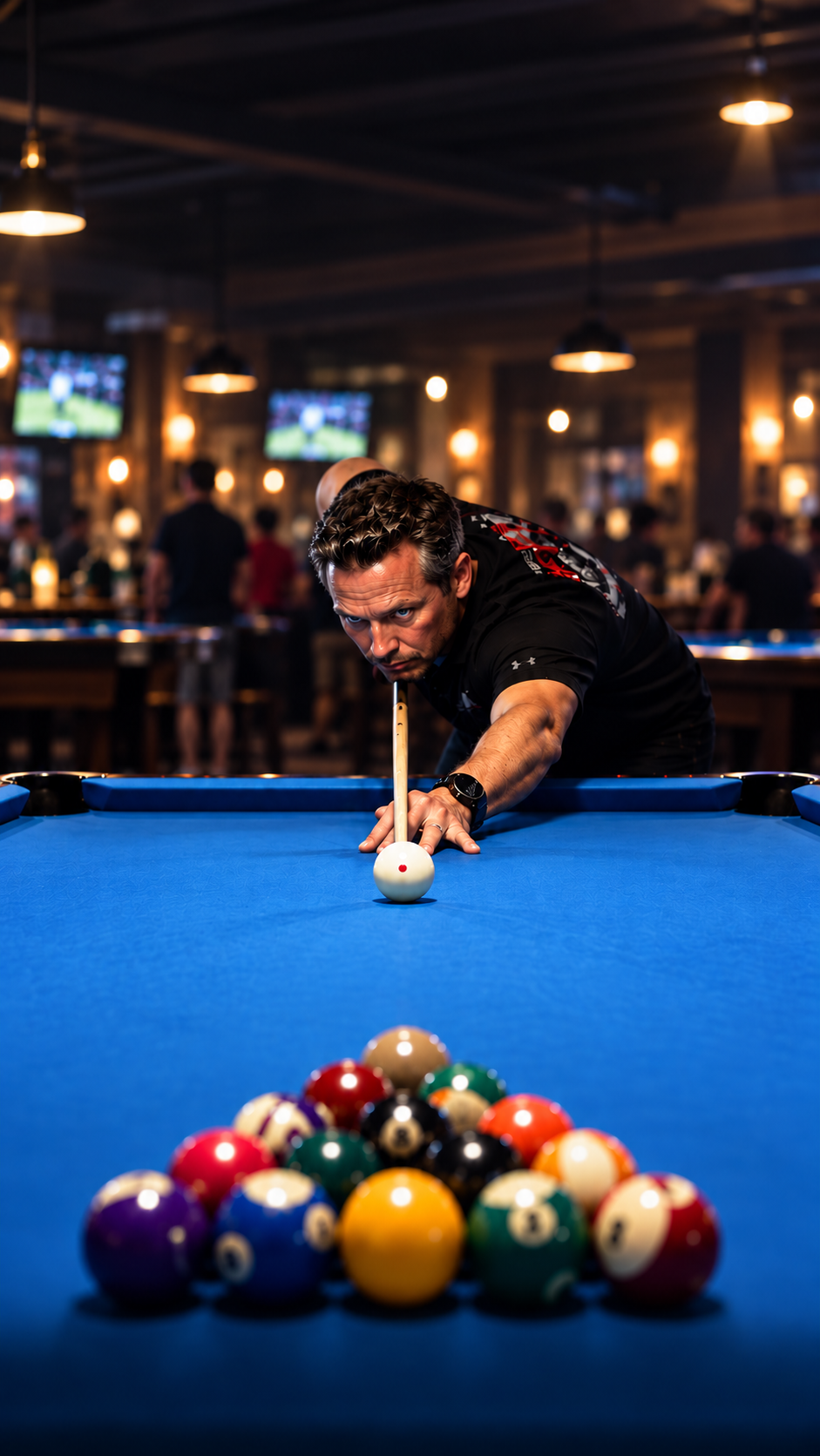 Pool player lining up a break on a blue-cloth table